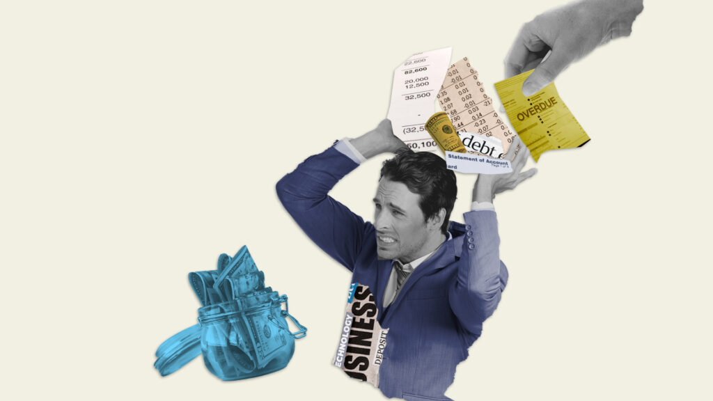 Stressed businessman holding head with financial documents and bills above, with hand holding an overdue notice and a transparent blue wallet with cash beside him.